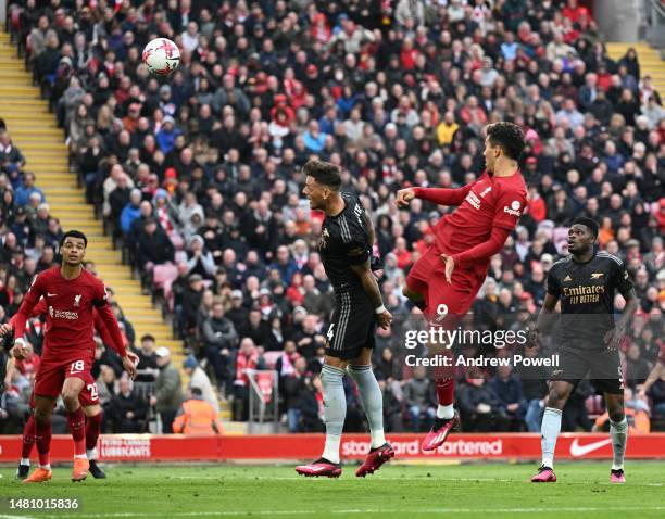 Roberto Firmino of Liverpool scores the second goal making the score 2-2 during the Premier League match between Liverpool FC and Arsenal FC at...