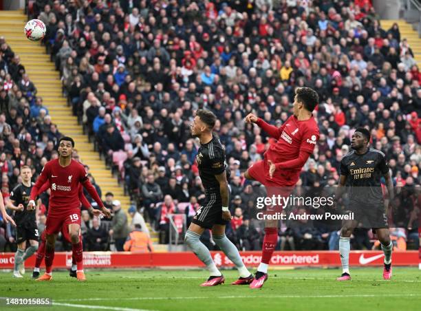 Roberto Firmino of Liverpool scores the second goal making the score 2-2 during the Premier League match between Liverpool FC and Arsenal FC at...