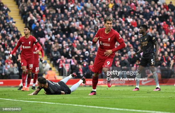 Roberto Firmino of Liverpool celebrates after scoring the second goal during the Premier League match between Liverpool FC and Arsenal FC at Anfield...