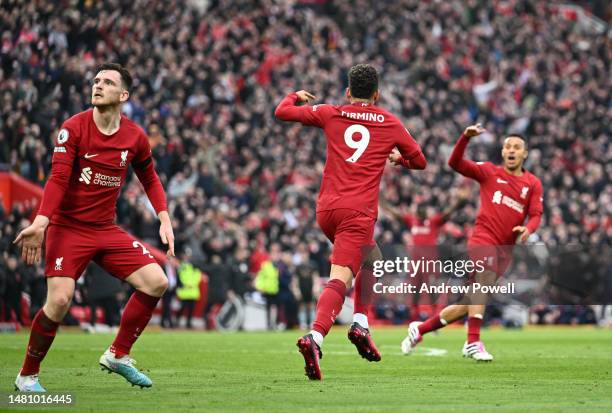 Roberto Firmino of Liverpool celebrates after scoring the second goal during the Premier League match between Liverpool FC and Arsenal FC at Anfield...