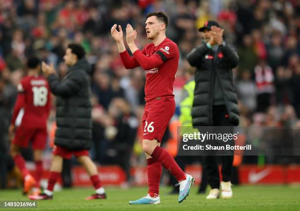 Andrew Robertson of Liverpool applauds the fans after the Premier League match between Liverpool FC and Arsenal FC at Anfield on April 09, 2023 in...