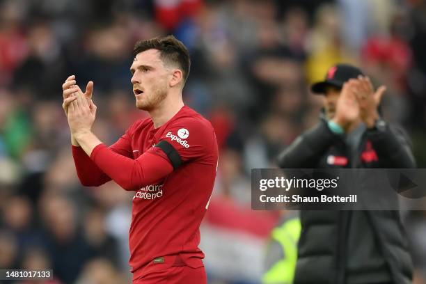 Andrew Robertson of Liverpool applauds the fans after the Premier League match between Liverpool FC and Arsenal FC at Anfield on April 09, 2023 in...