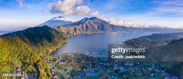 panoramic landscape of batur volcanic caldeira in bali indonesia - agung stock pictures, royalty-free photos & images