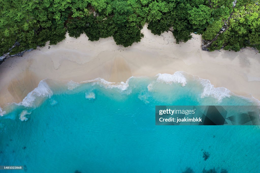 Idyllic white sand beach in Bali Indonesia