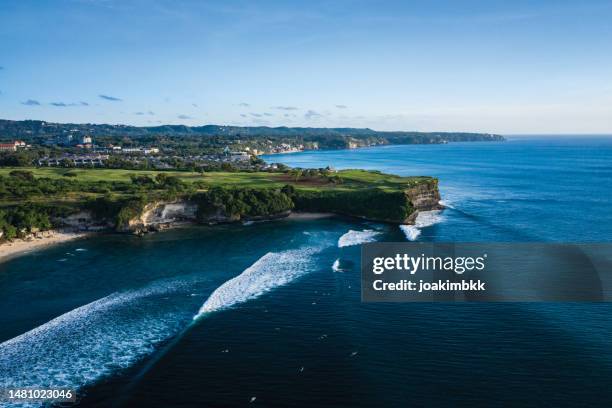 balangan coastline taken by drone in bali indonesia - indonesia aerial stock pictures, royalty-free photos & images