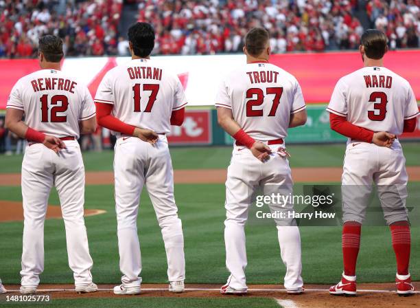 Hunter Renfroe, Shohei Ohtani, Mike Trout and Taylor Ward of the Los Angeles Angels line up for the National Anthem before the game against the...