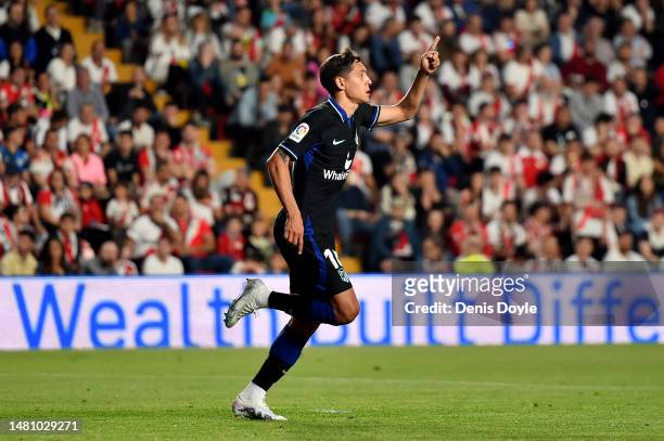Nahuel Molina of Atletico Madrid celebrates after scoring the team's first goal during the LaLiga Santander match between Rayo Vallecano and Atletico...