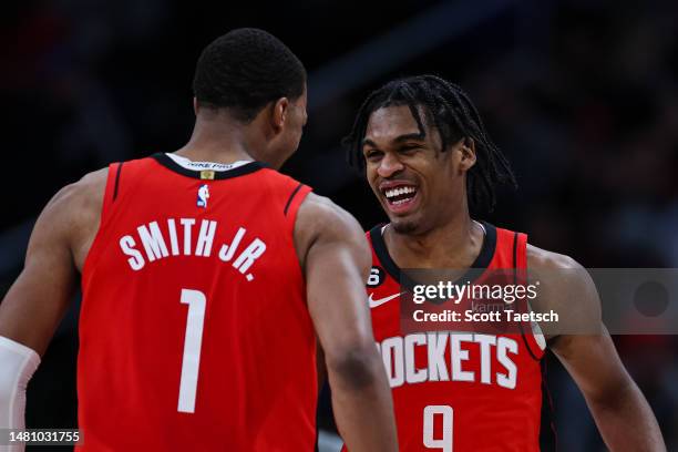 Josh Christopher of the Houston Rockets celebrates with Jabari Smith Jr. #1 after a play against the Washington Wizards during the second half at...