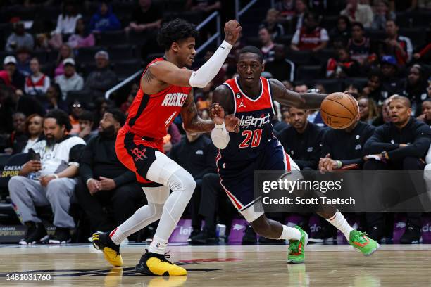 Kendrick Nunn of the Washington Wizards drives to the basket against Jalen Green of the Houston Rockets during the second half at Capital One Arena...