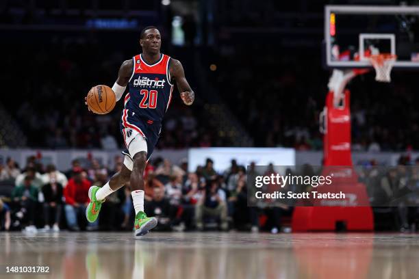 Kendrick Nunn of the Washington Wizards brings the ball up court against the Houston Rockets during the second half at Capital One Arena on April 9,...