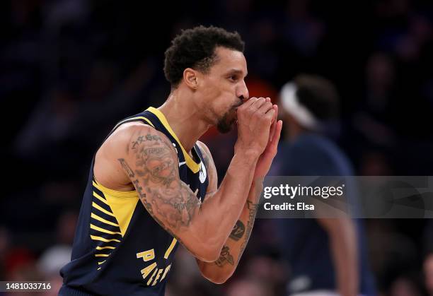 George Hill of the Indiana Pacers celebrates his three point shot in the second half against the New York Knicks at Madison Square Garden on April...