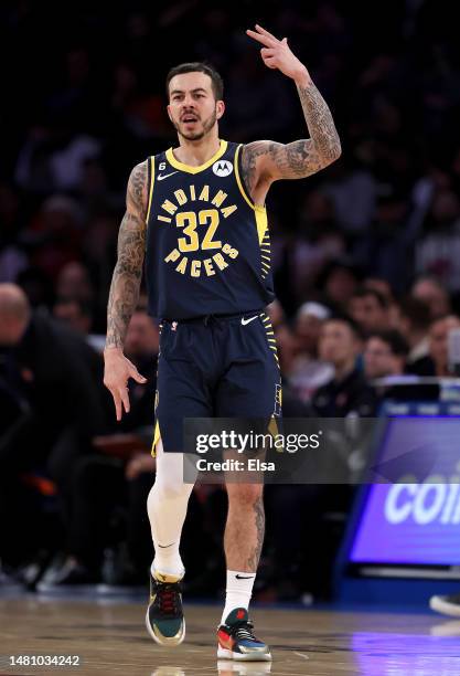 Gabe York of the Indiana Pacers celebrates teammate George Hill's three point shot in the second half against the New York Knicks at Madison Square...