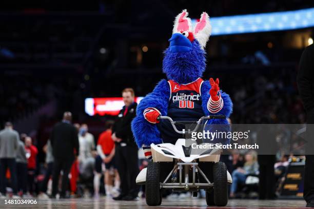 The Washington Wizards mascot performs with rabbit ears in celebration of Easter during the second half of the game between the Washington Wizards...
