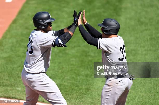 Franchy Cordero of the New York Yankees celebrates with Jose Trevino after hitting a two-run home run in the fifth inning against the Baltimore...