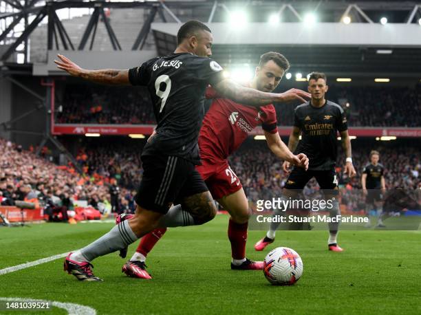 Gabriel Jesus of Arsenal challenges by Diogo Jota of Liverpool during the Premier League match between Liverpool FC and Arsenal FC at Anfield on...