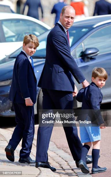 Prince George of Wales, Prince William, Prince of Wales and Prince Louis of Wales attend the traditional Easter Sunday Mattins Service at St George's...