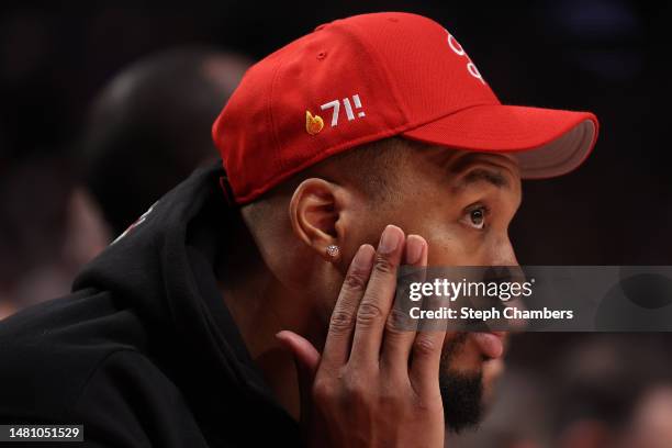 Damian Lillard of the Portland Trail Blazers looks on during the third quarter against the Golden State Warriors at Moda Center on April 09, 2023 in...