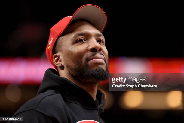 Damian Lillard of the Portland Trail Blazers looks on during the third quarter against the Golden State Warriors at Moda Center on April 09, 2023 in...