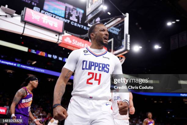 Norman Powell of the Los Angeles Clippers reacts after a basket during the second half of the game against the Phoenix Suns at Footprint Center on...