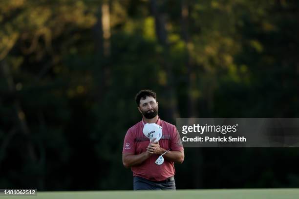 Jon Rahm of Spain reacts as he approaches the 18th green during the final round of the 2023 Masters Tournament at Augusta National Golf Club on April...