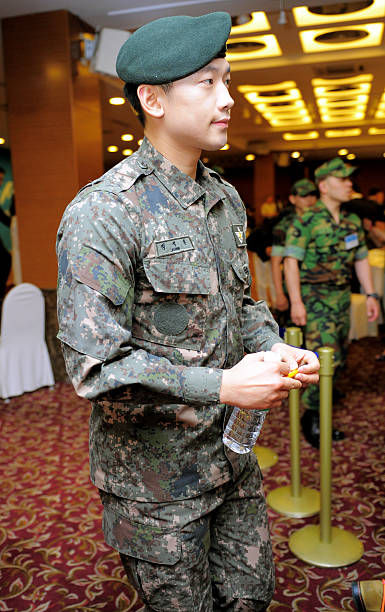 KOR: Rain Attends '2012 Noble Military Family Awards'