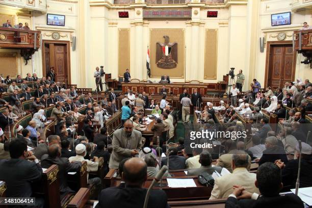 General view show the first session of the Egyptian parliament in Cairo on July 10 after Egypt's top court rejected a decree by President Mohamed...