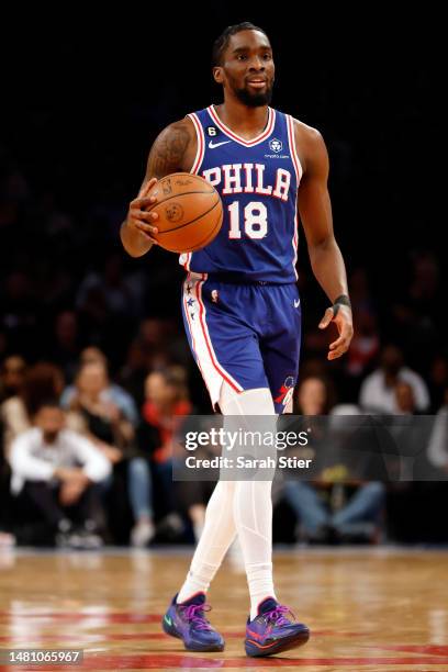 Shake Milton of the Philadelphia 76ers dribbles during the second half against the Brooklyn Nets at Barclays Center on April 09, 2023 in the Brooklyn...