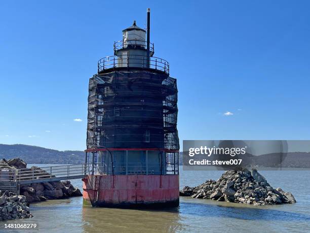 restoration of the tarrytown lighthouse also know as the sleepy hollow lighthouse. - tarrytown stock pictures, royalty-free photos & images