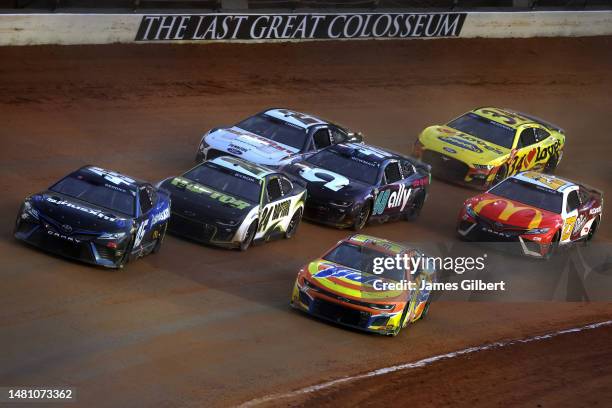 Tyler Reddick, driver of the SiriusXM Radio Toyota, William Byron, driver of the RaptorTough.com Chevrolet, Justin Haley, driver of the Tide...