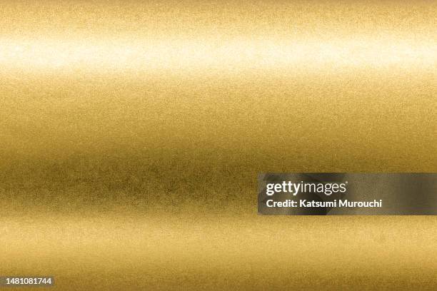 metallic gold paper texture background - gold coins stock pictures, royalty-free photos & images