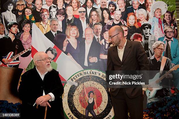 Sir Peter Blake and Wayne Hemingway MBE pose for pictures as they reflect back on Blake's 60 year career and their shared love of collecting mass...