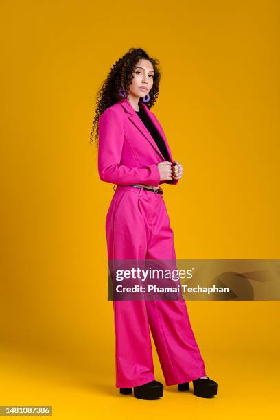 fashionable woman wearing pink - pink suit stock pictures, royalty-free photos & images