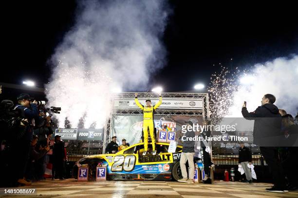 Christopher Bell, driver of the DeWalt Power Stack Toyota, celebrates in victory lane after winning the NASCAR Cup Series Food City Dirt Race at...