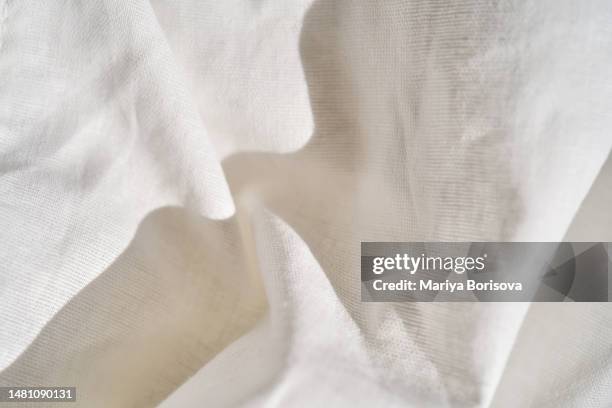 texture of white natural cotton fabric. - linen shirt stock pictures, royalty-free photos & images