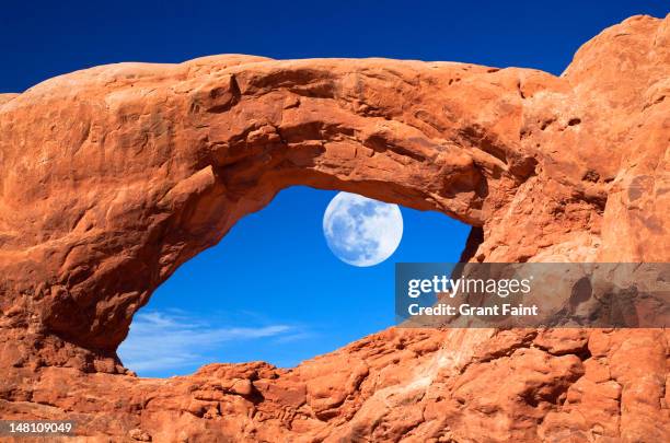 arches national park, west window with moonrise - rock formation stock pictures, royalty-free photos & images