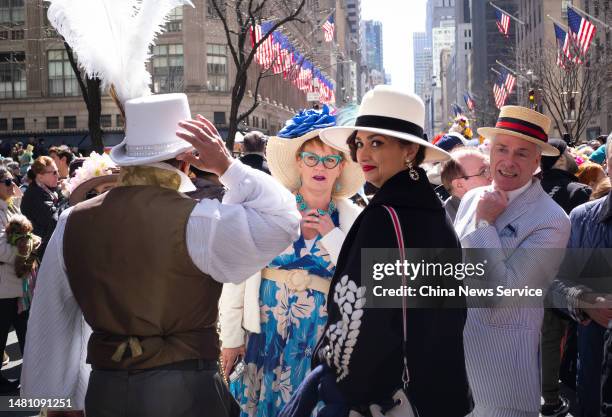 People wearing Easter bonnets participate in the annual Easter Parade at the Fifth Avenue on April 9, 2023 in New York City.