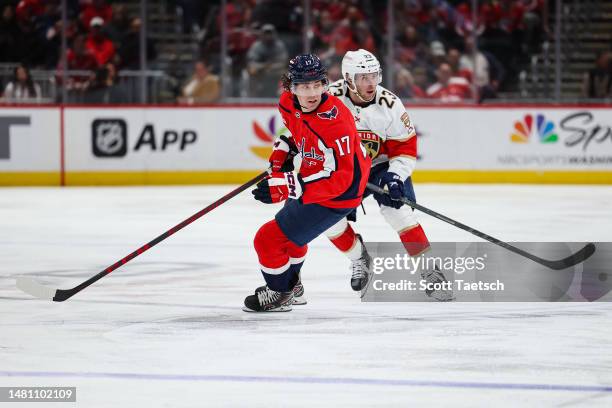 Dylan Strome of the Washington Capitals and Carter Verhaeghe of the Florida Panthers in action during the third period of the game at Capital One...
