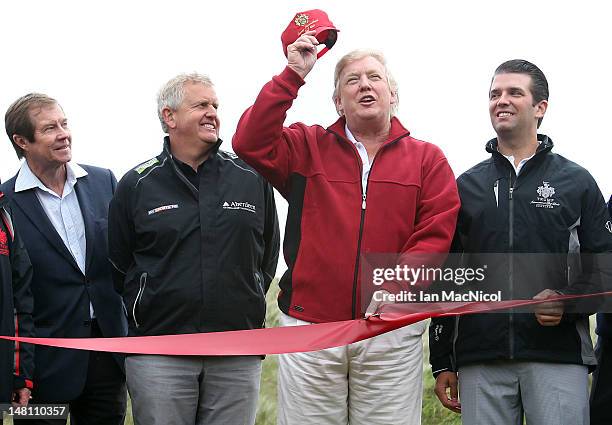 Donald Trump opens The Trump International Golf Links Course as George O'Grady, Colin Montgomerie and Don Trump Jr look on, on July 10, 2012 in...