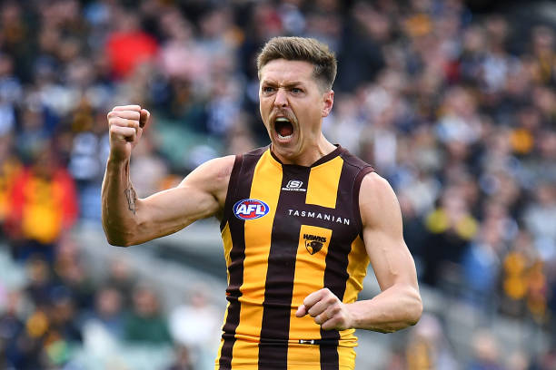 Fergus Greene of the Hawks celebrates kicking a goal during the round four AFL match between Geelong Cats and Hawthorn Hawks at Melbourne Cricket...