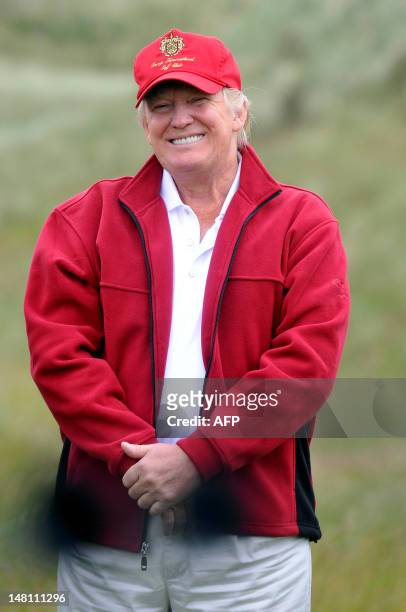 Tycoon Donald Trump is pictured as he officially opens his new multi-million pound Trump International Golf Links course in Aberdeenshire, Scotland,...