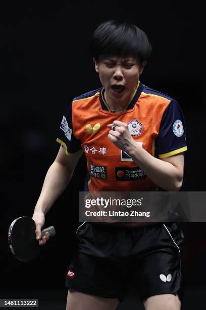 Cheng I-Ching of Chinese Taipei celebrates match point against Sofia Polcanova of Austria in their Women's singles Round of 32 match on day one of...