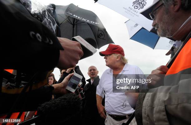 Tycoon Donald Trump addresses the media as he officially opens his new multi-million pound Trump International Golf Links course in Aberdeenshire,...