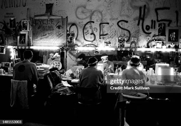Members of the Cycle Sluts prepare in the dressing room for a performance at the Whisky A Go Go, West Hollywood, CA 1975.