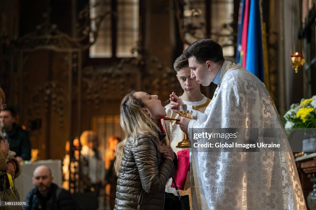 Eastern Rite Communion A priest conducts the rite of Communion during the Palm Sunday's ...