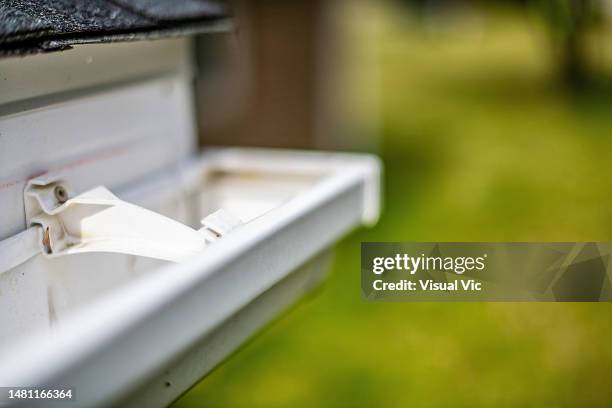 locked gutter - cleaning gutters stock pictures, royalty-free photos & images