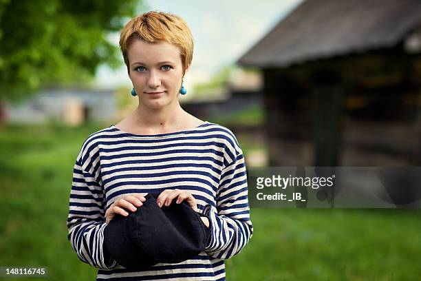 young beautiful modest country girl poses - skinny blonde stock pictures, royalty-free photos & images