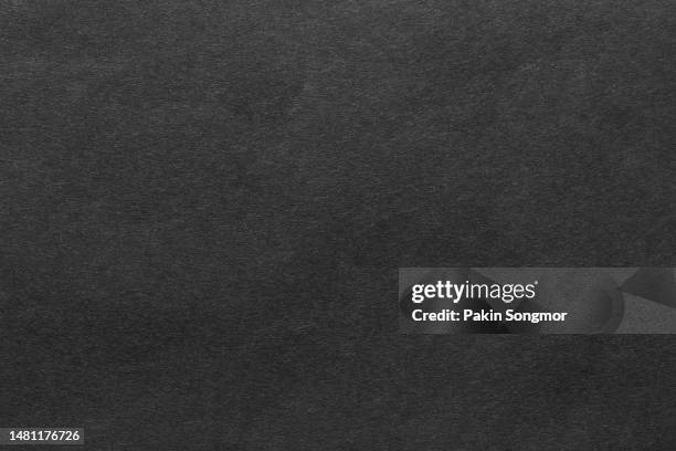 black color eco recycled kraft paper sheet texture cardboard background. - black craft paper stock pictures, royalty-free photos & images