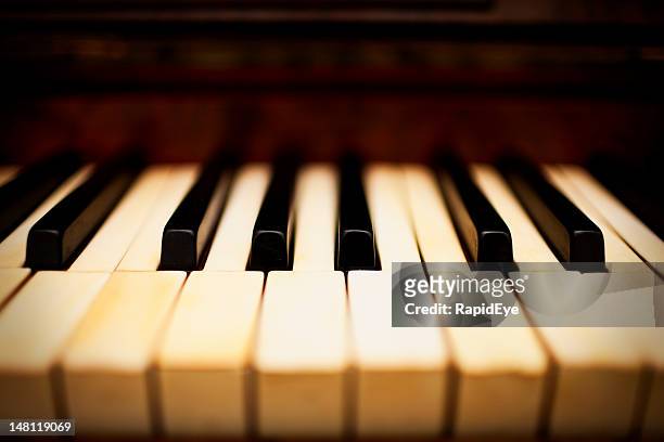 dreamy piano keys - old fashioned key stock pictures, royalty-free photos & images