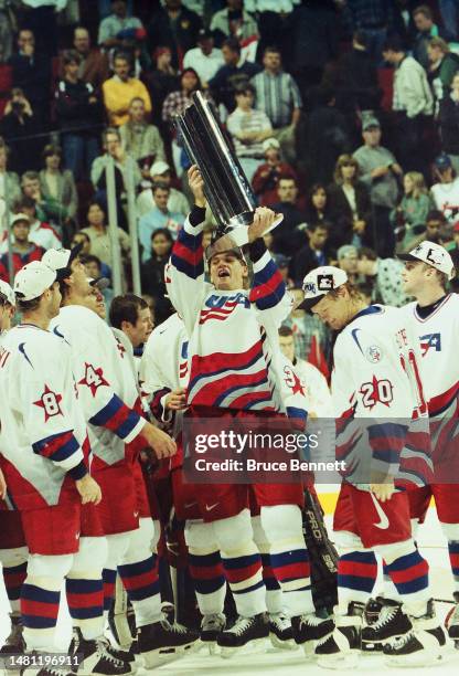 Derian Hatcher of Team USA celebrates victory over Team Canada at the World Cup of Hockey tournament on September 14, 1996 in Montreal, Quebec,...