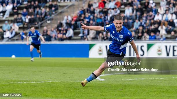 Nick Cherny of Bielefeld celebrates his side's third goal during the B juniors german championship semi final leg two match between FC Schalke 04 and...